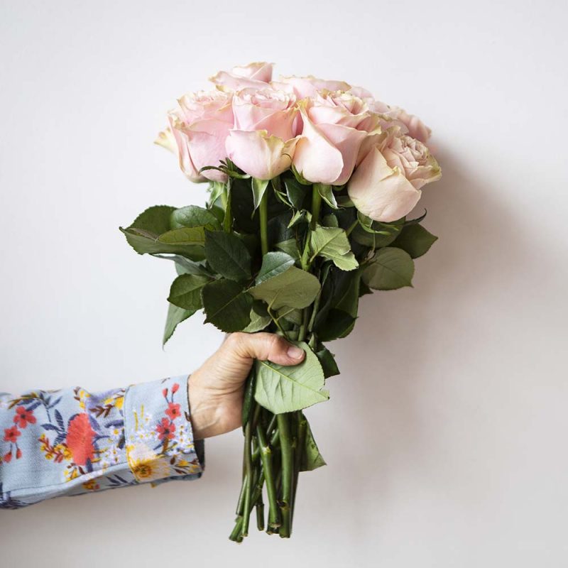 woman-holding-a-bouquet-NSRZQYW.jpg